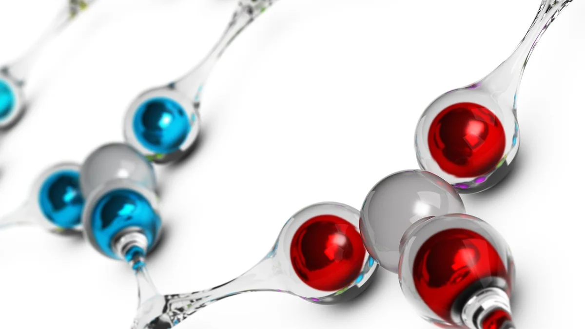 Glass molecular model illustrating connected chemical structures.